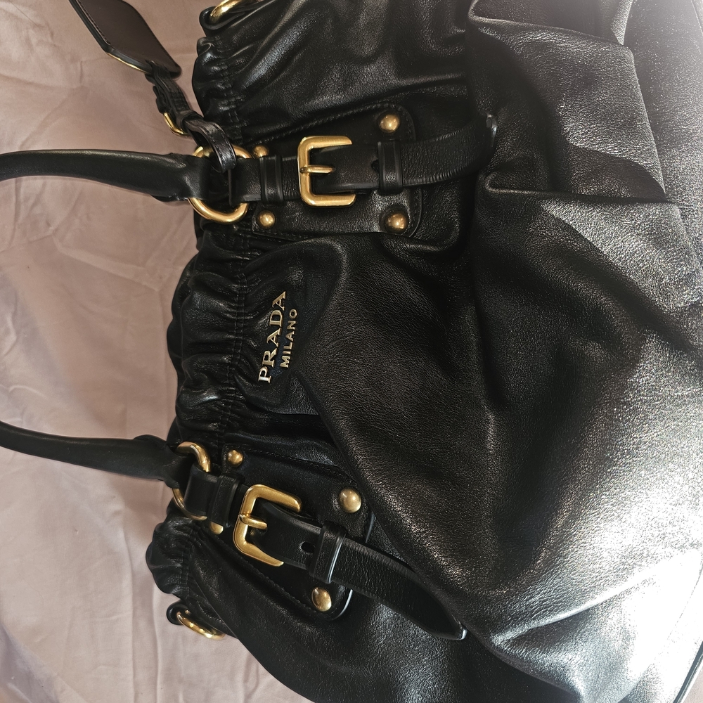 Prada Elegant Black Shoulder Bag with Gold Details